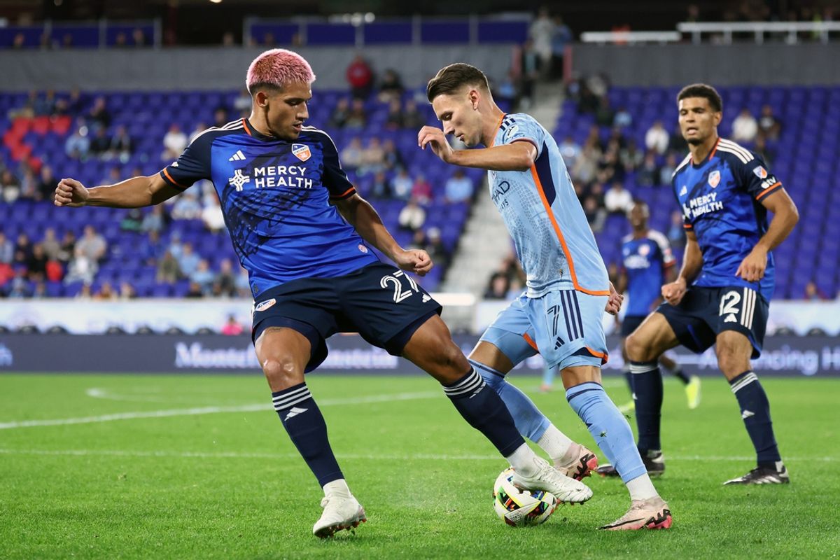Oct 2, 2024; New York, New York, USA; FC Cincinnati midfielder Yamil Asad (27) and New York City FC forward Hannes Wolff (17) battle for the ball in the second half at Red Bull Arena. Mandatory Credit: Vincent Carchietta-Imagn Images