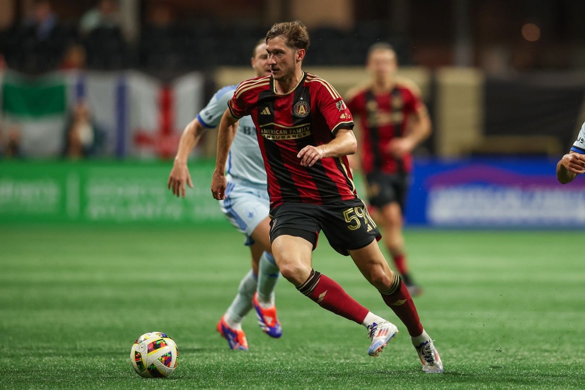 Oct 2, 2024; Atlanta, Georgia, USA; Atlanta United midfielder Alexey Miranchuk (59) handles the ball against CF Montreal in the second half at Mercedes-Benz Stadium. Mandatory Credit: Brett Davis-Imagn Images