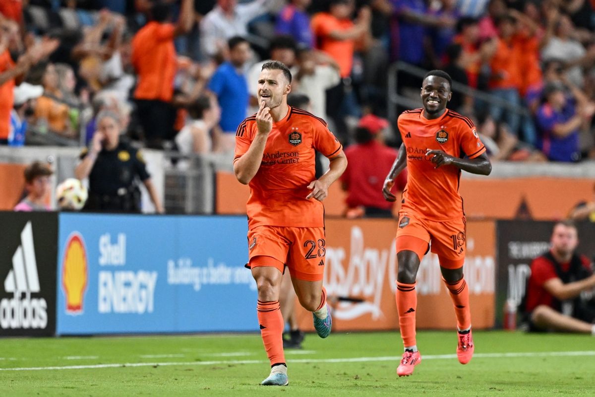 Oct 2, 2024; Houston, Texas, USA; Houston Dynamo FC defender Erik Sviatchenko (28) celebrates after scoring a goal against the New England Revolution in the second half at Shell Energy Stadium. Mandatory Credit: Maria Lysaker-Imagn Images