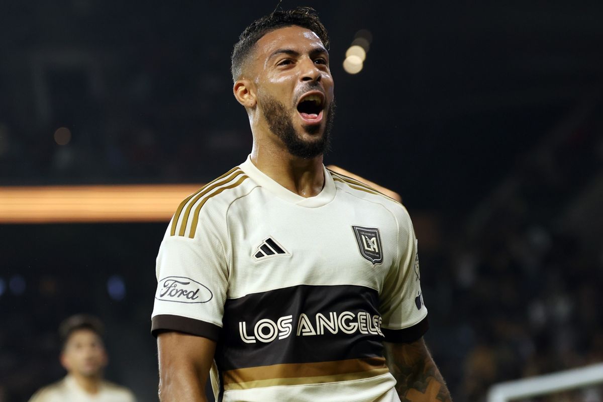Oct 2, 2024; Los Angeles, California, USA; LAFC forward Denis Bouanga (99) celebrates after scoring a goal against St. Louis CITY SC in the first half at BMO Stadium. Mandatory Credit: Kiyoshi Mio-Imagn Images