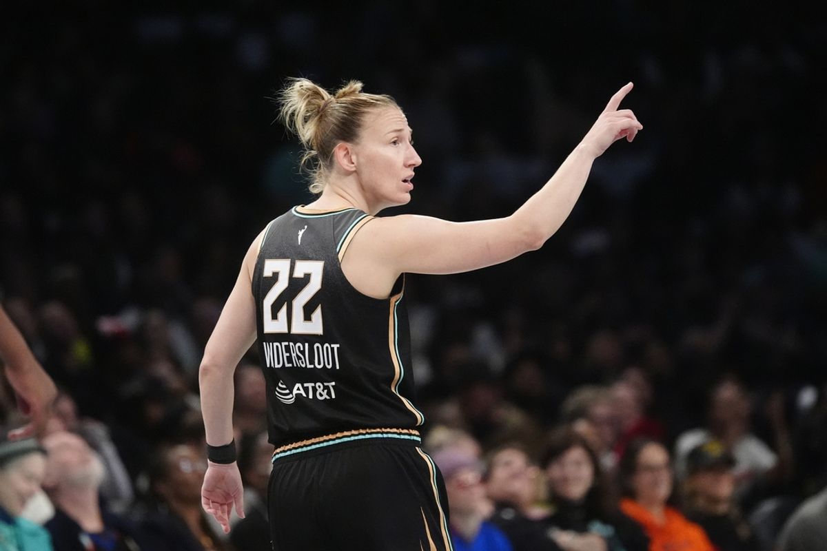 Sep 29, 2024; Brooklyn, New York, USA; New York Liberty guard Courtney Vandersloot (22) reacts to a play on the court against the Las Vegas Aces during game one of the 2024 WNBA Semi-finals at Barclays Center. Mandatory Credit: Gregory Fisher-Imagn Images