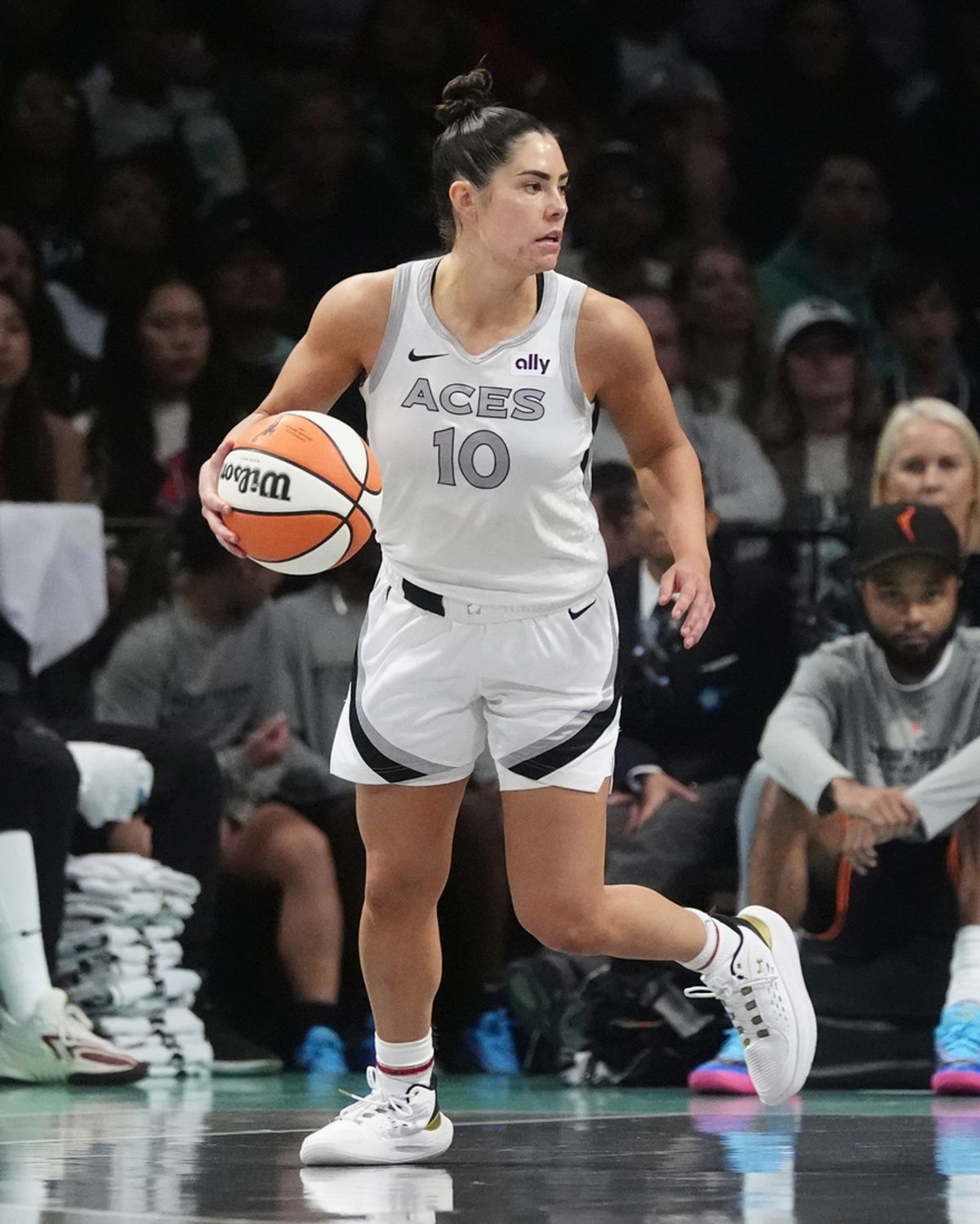 Sep 29, 2024; Brooklyn, New York, USA; Las Vegas Aces guard Kelsey Plum (10) dribbles the ball against the New York Liberty during game one of the 2024 WNBA Semi-finals at Barclays Center. Mandatory Credit: Gregory Fisher-Imagn Images
