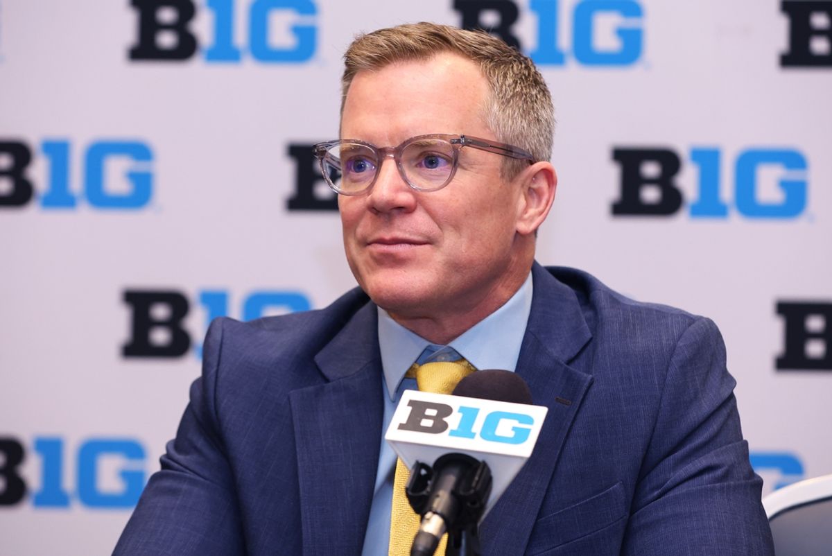 Oct 3, 2024; Rosemont, IL, USA; Michigan head coach Dusty May takes a question at the podium during the 2024 Big Ten Menís Basketball media day at Donald E. Stephens Convention Center. Mandatory Credit: Melissa Tamez-Imagn Images