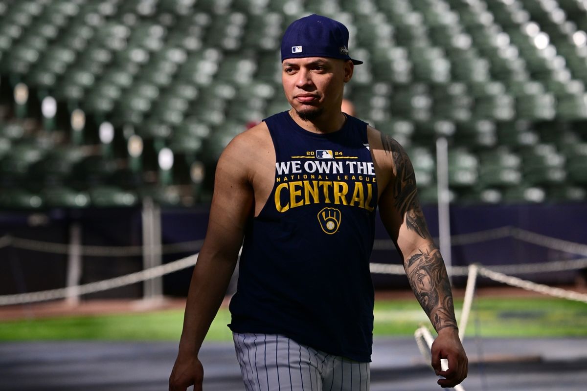 Oct 3, 2024; Milwaukee, Wisconsin, USA;  Milwaukee Brewers catcher William Contreras (24) warms up before the game three of the Wildcard round against the New York Mets in the 2024 MLB Playoffs at American Family Field. Mandatory Credit: Benny Sieu-Imagn Images