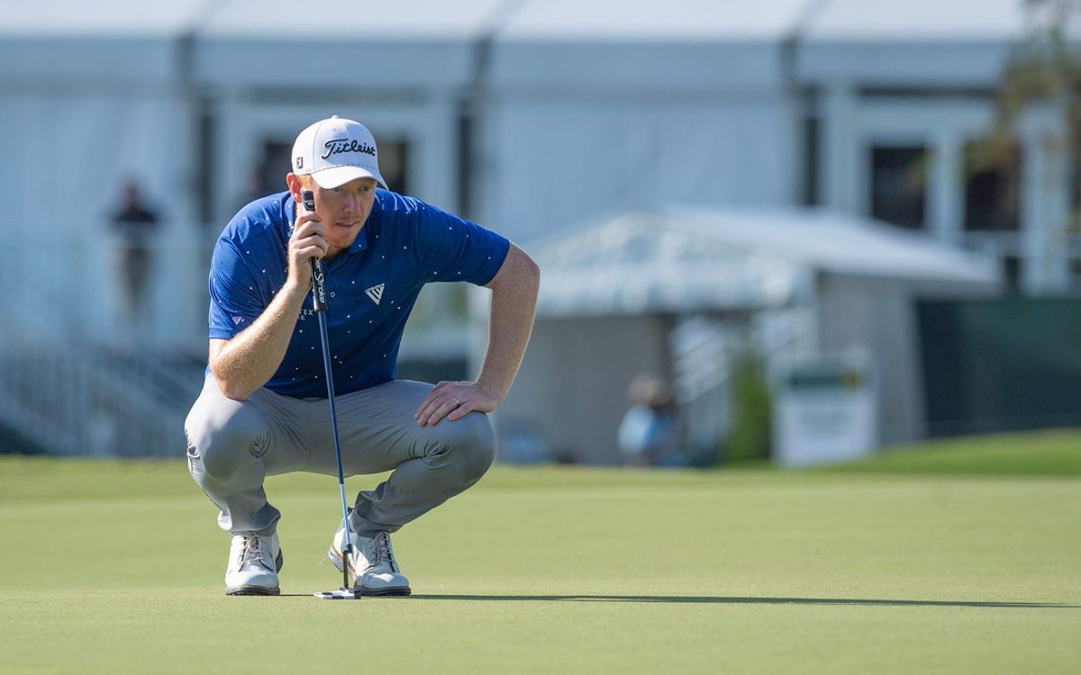 Hayden Springer of Trophy Club, Texas, reads the green before putting on the 9th during the second round of the Sanderson Farms Championship at the Country Club of Jackson in Jackson, Miss., Thursday, Oct. 3, 2024.
