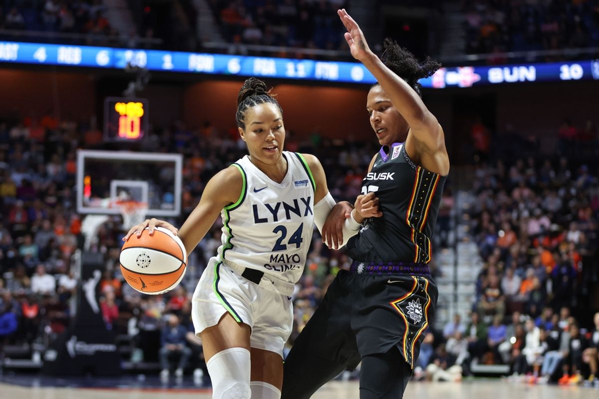 Oct 4, 2024; Uncasville, Connecticut, USA; Minnesota Lynx forward Napheesa Collier (24) drives to the basket defended by Connecticut Sun forward Alyssa Thomas (25) during the first half during game three of the 2024 WNBA Semi-finals at Mohegan Sun Arena. Mandatory Credit: Paul Rutherford-Imagn Images