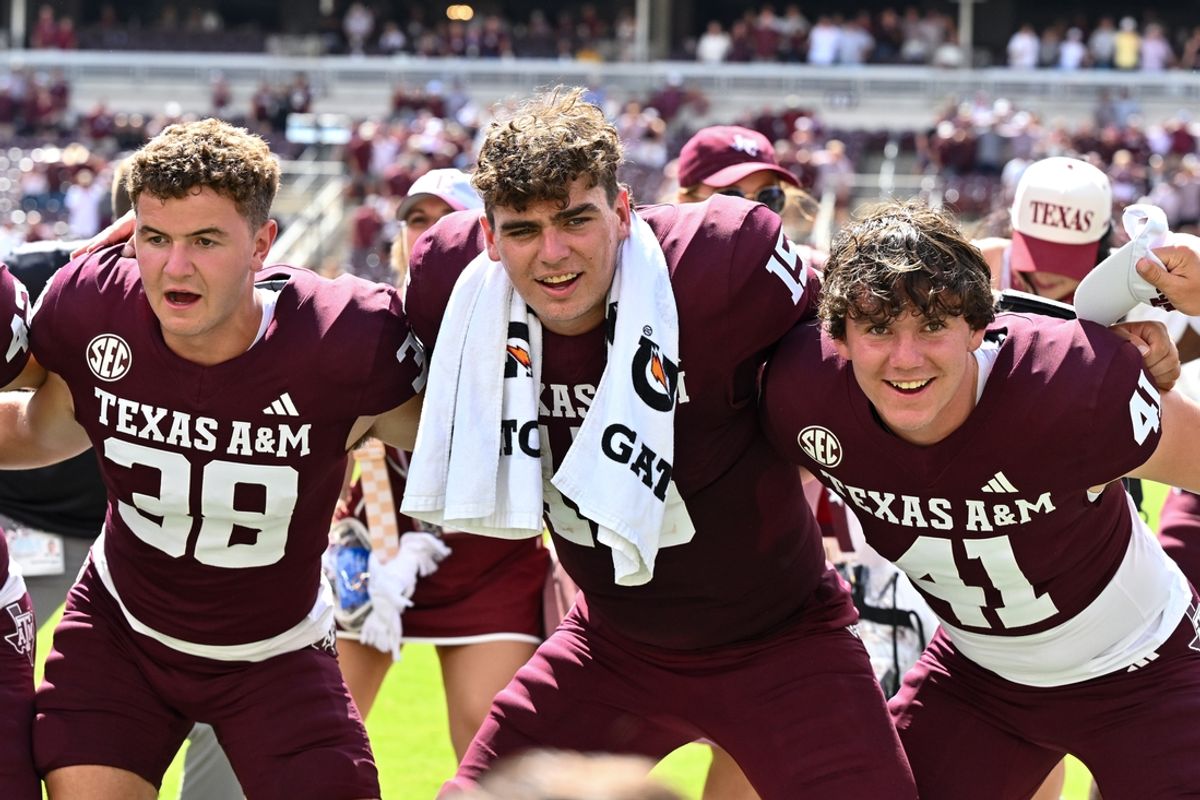 Oct 5, 2024; College Station, Texas, USA; Texas A&M Aggies quarterback Conner Weigman (center) celebrates with teammates after the win over Missouri Tigers at Kyle Field. Mandatory Credit: Maria Lysaker-Imagn Images.