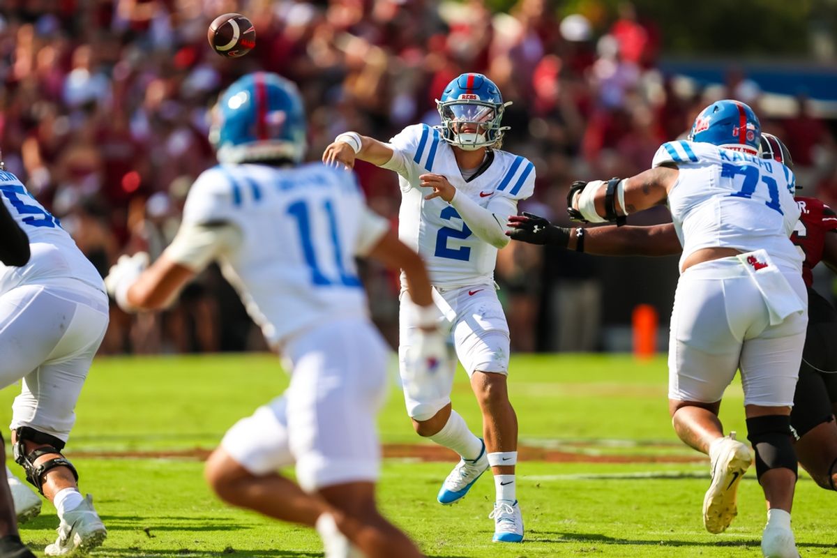 Oct 5, 2024; Columbia, South Carolina, USA; Mississippi Rebels quarterback Jaxson Dart (2) passes against the South Carolina Gamecocks in the first quarter at Williams-Brice Stadium. Mandatory Credit: Jeff Blake-Imagn Images