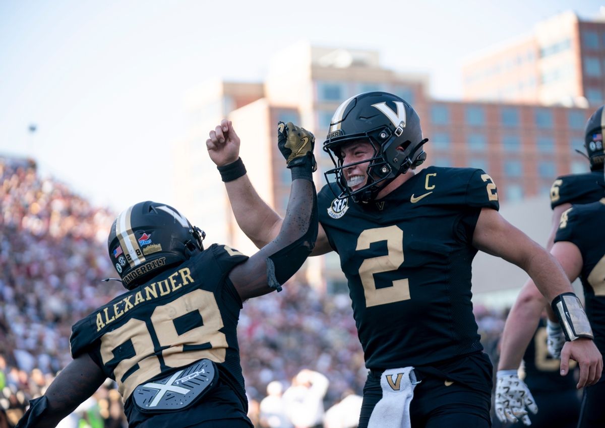 Vanderbilt Commodores running back Sedrick Alexander (28) and quarterback Diego Pavia (2)celebrate a touchdown in the end zone against the Alabama Crimson Tide during their game at Vanderbilt Stadium in Nashville, Tenn., Saturday, Oct. 5, 2024.