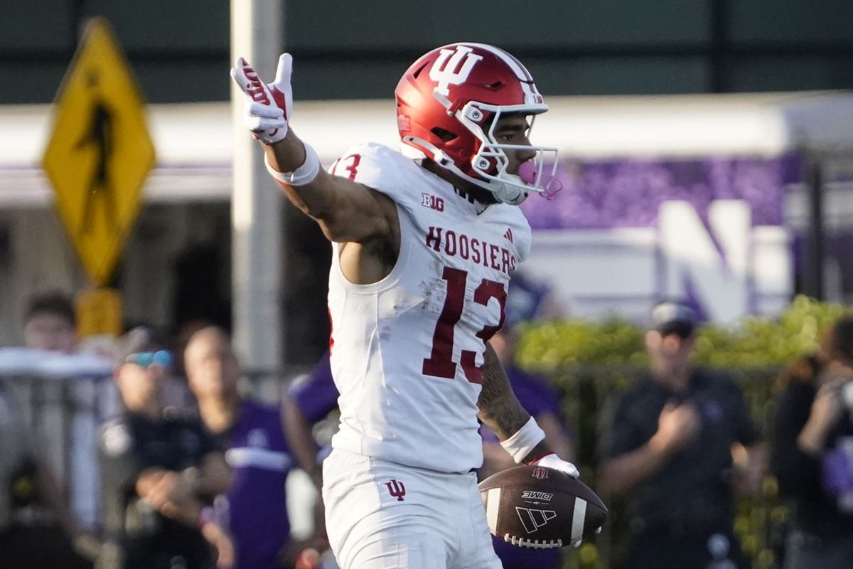 Oct 5, 2024; Evanston, Illinois, USA; Indiana Hoosiers wide receiver Elijah Sarratt (13) gestures for a first down against the Northwestern Wildcats during the second half at Lanny and Sharon Martin Stadium. Mandatory Credit: David Banks-Imagn Images