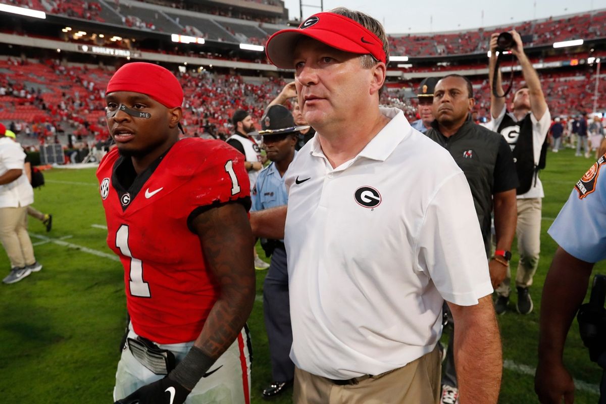 Georgia head coach Kirby Smart and Georgia running back Trevor Etienne (1) leave the field after winning a NCAA college football game against Auburn in Athens, Ga., on Saturday, Oct. 5, 2024. Georgia won 31-13.