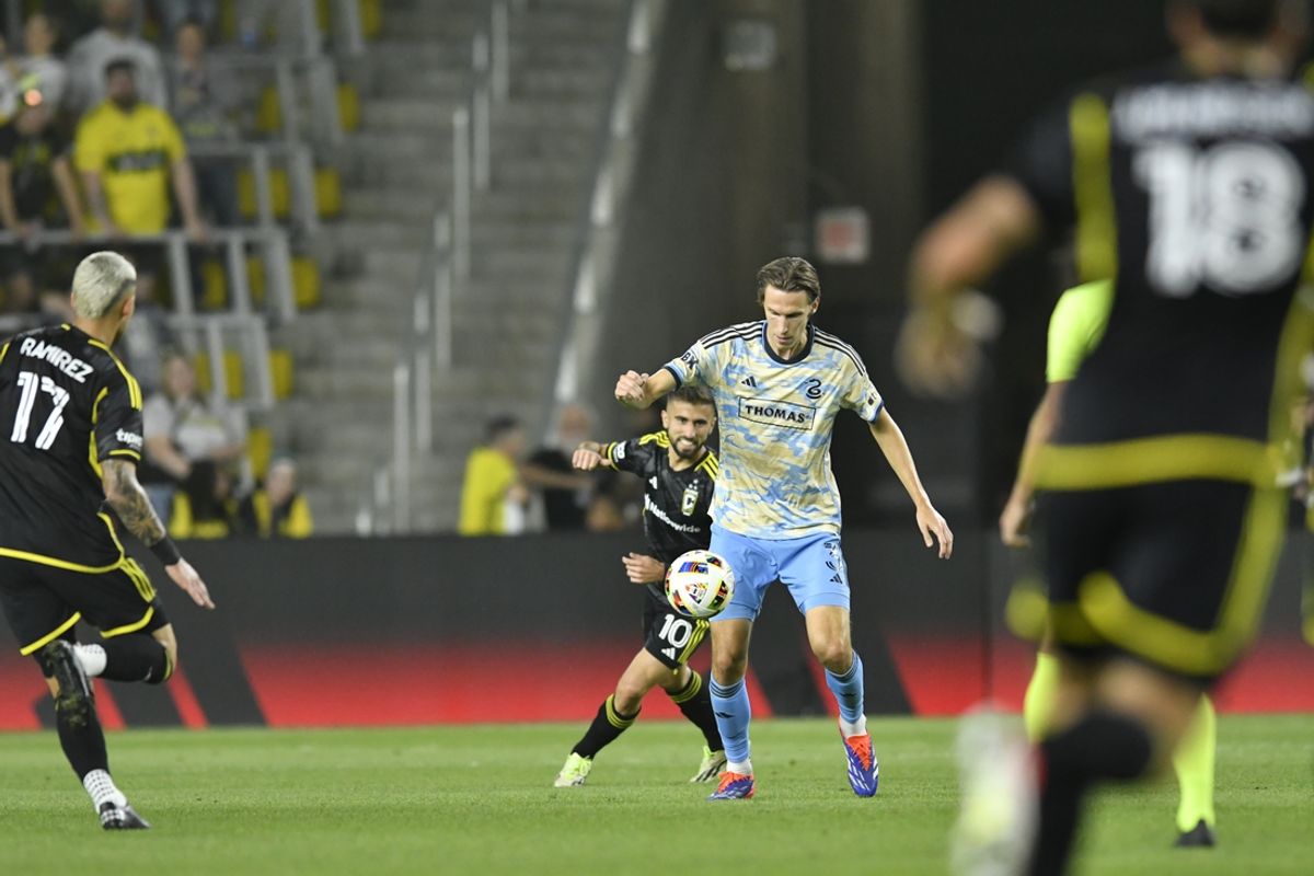 Oct 5, 2024; Columbus, Ohio, USA;  Philadelphia Union defender Jack Elliott (3) takes the ball away from Columbus Crew forward Diego Rossi (10) during the first half of the of the Major League Soccer match between the Columbus Crew and the Philadelphia Union at Lower.com Field. Mandatory Credit: Matt Lunsford-Imagn Images