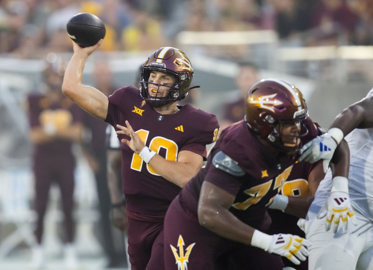 Oct 5, 2024; Tempe, Arizona, USA; Arizona State Sun Devils quarterback Sam Leavitt (10) against the Kansas Jayhawks in the first half at Mountain America Stadium. Mandatory Credit: Mark J. Rebilas-Imagn Images