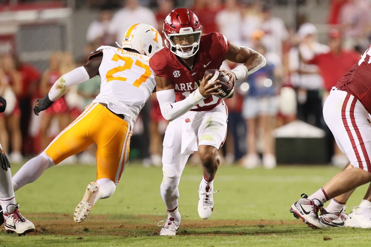 Oct 5, 2024; Fayetteville, Arkansas, USA; Arkansas Razorbacks quarterback Taylen Green (10) rushes in the first quarter against the Tennessee Volunteers at Donald W. Reynolds Razorback Stadium. Mandatory Credit: Nelson Chenault-Imagn Images