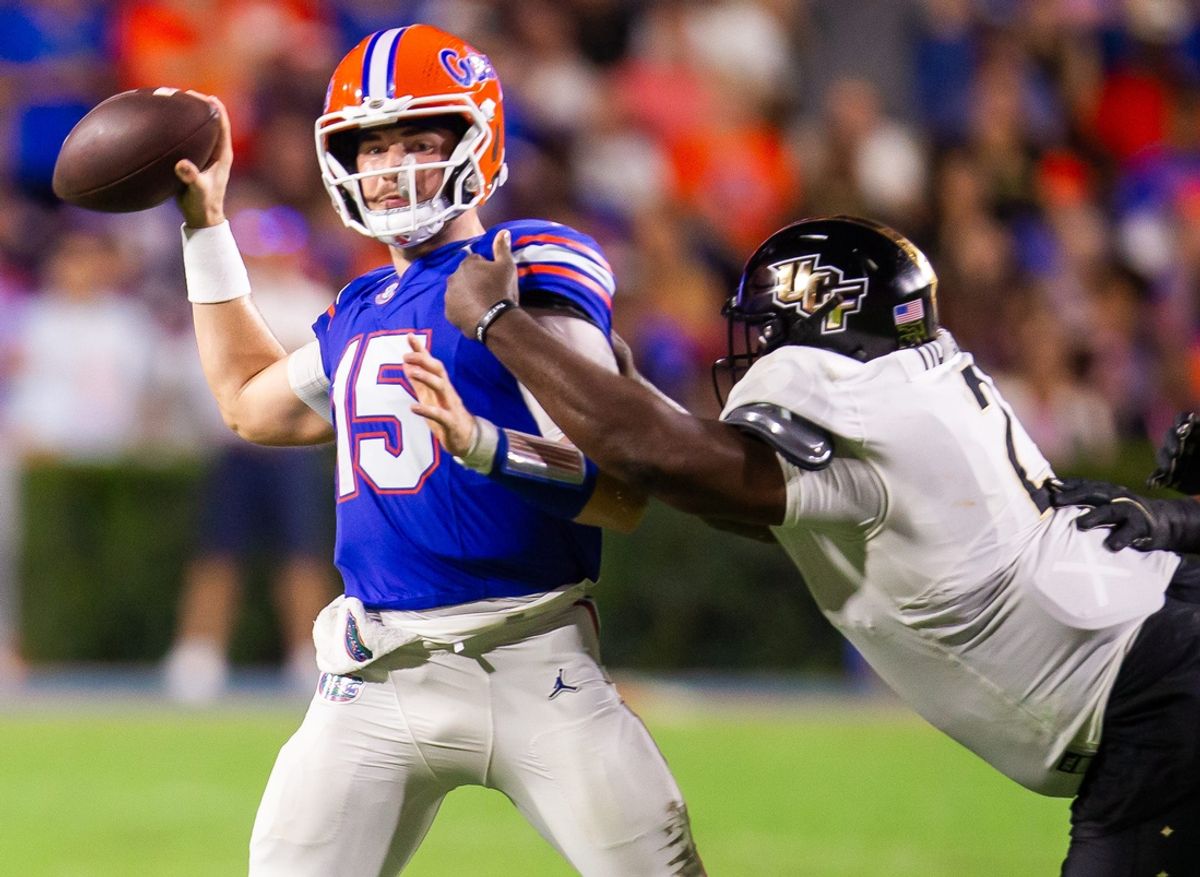 Knights defensive tackle Lee Hunter (2) pressures Florida Gators quarterback Graham Mertz (15) during the first half at Ben Hill Griffin Stadium in Gainesville, FL on Saturday, October 5, 2024. [Doug Engle/Gainesville Sun]