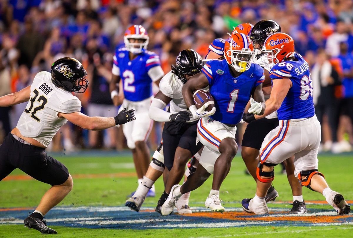 Florida Gators running back Montrell Johnson Jr. (1) breaks through a hole during the first half at Ben Hill Griffin Stadium in Gainesville, FL on Saturday, October 5, 2024. [Doug Engle/Gainesville Sun]