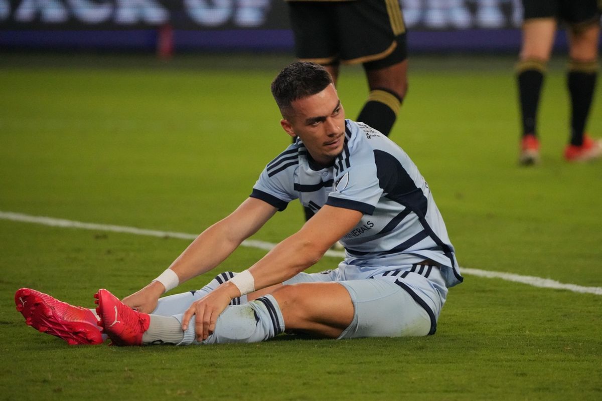 Oct 5, 2024; Kansas City, Kansas, USA; Sporting Kansas City midfielder Erik Thommy (26) reacts on the pitch in the second half against the LAFC at Children's Mercy Park. Mandatory Credit: Denny Medley-Imagn Images