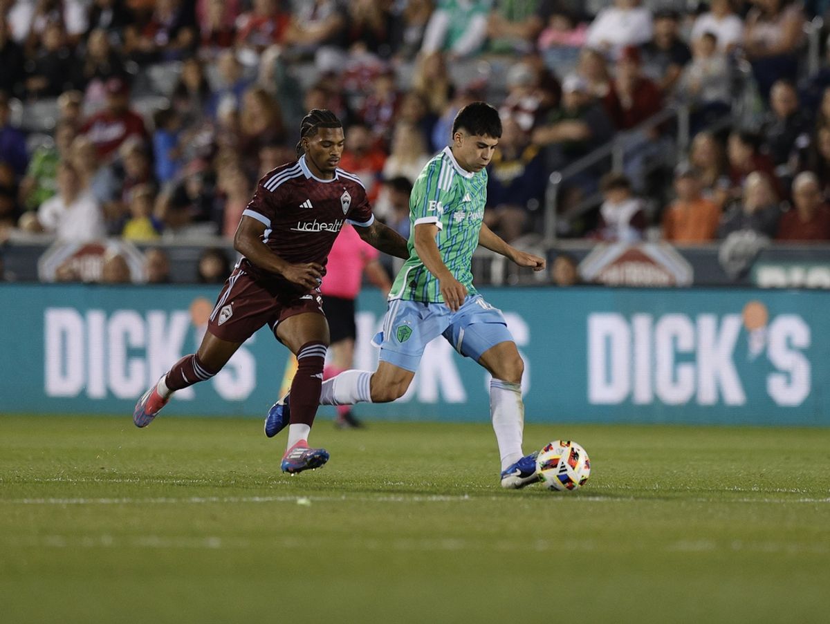 Oct 5, 2024; Commerce City, Colorado, USA; Seattle Sounders FC midfielder Obed Vargas (18) battles Colorado Rapids forward Kimani Stewart-Baynes (27) for control of a ball during the second half at Dick's Sporting Goods Park. Mandatory Credit: Isaiah J. Downing-Imagn Images
