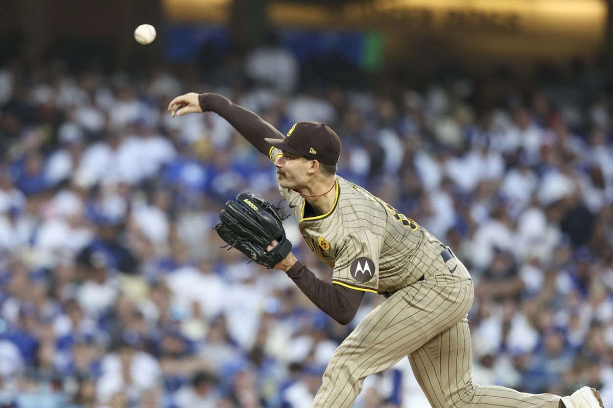 Oct 5, 2024; Los Angeles, California, USA; San Diego Padres pitcher Dylan Cease (84) throws a pitch in the second inning against the Los Angeles Dodgers during game one of the NLDS for the 2024 MLB Playoffs at Dodger Stadium. Mandatory Credit: Kiyoshi Mio-Imagn Images
