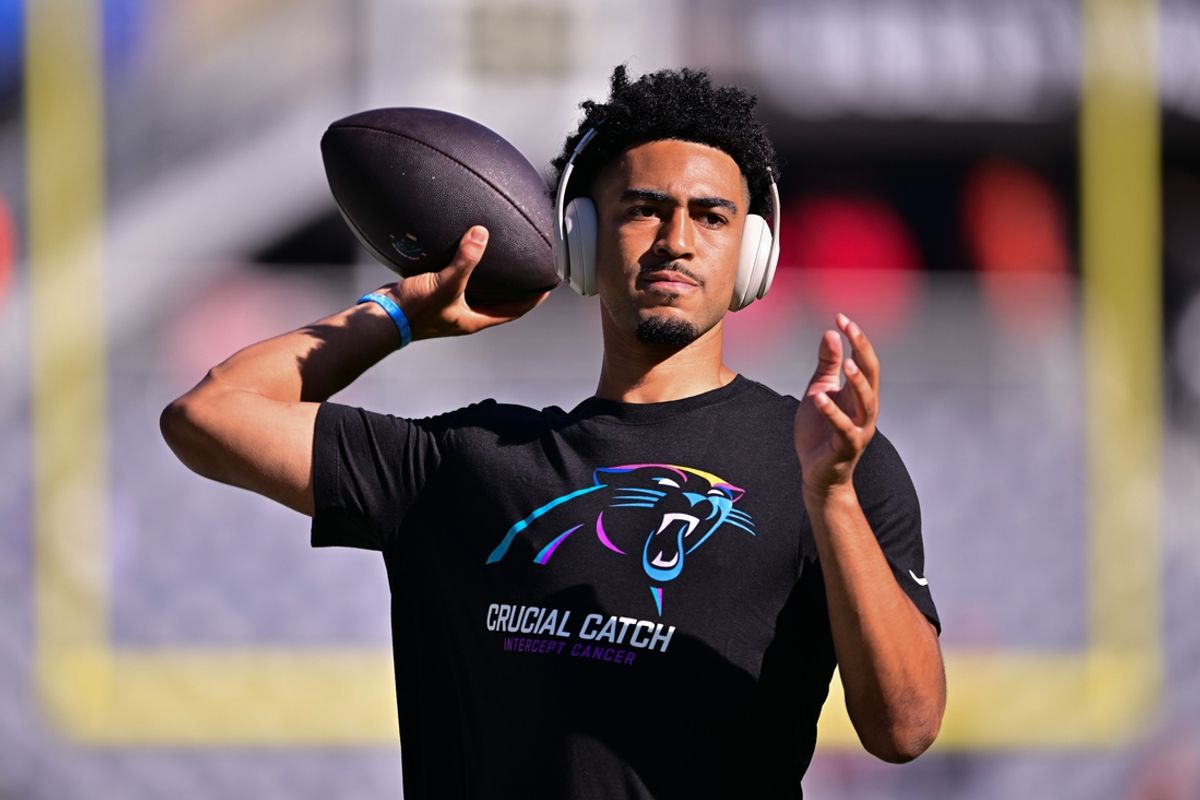 Oct 6, 2024; Chicago, Illinois, USA; Carolina Panthers quarterback Bryce Young (9) warms up before the game against the Chicago Bears at Soldier Field. Mandatory Credit: Daniel Bartel-Imagn Images