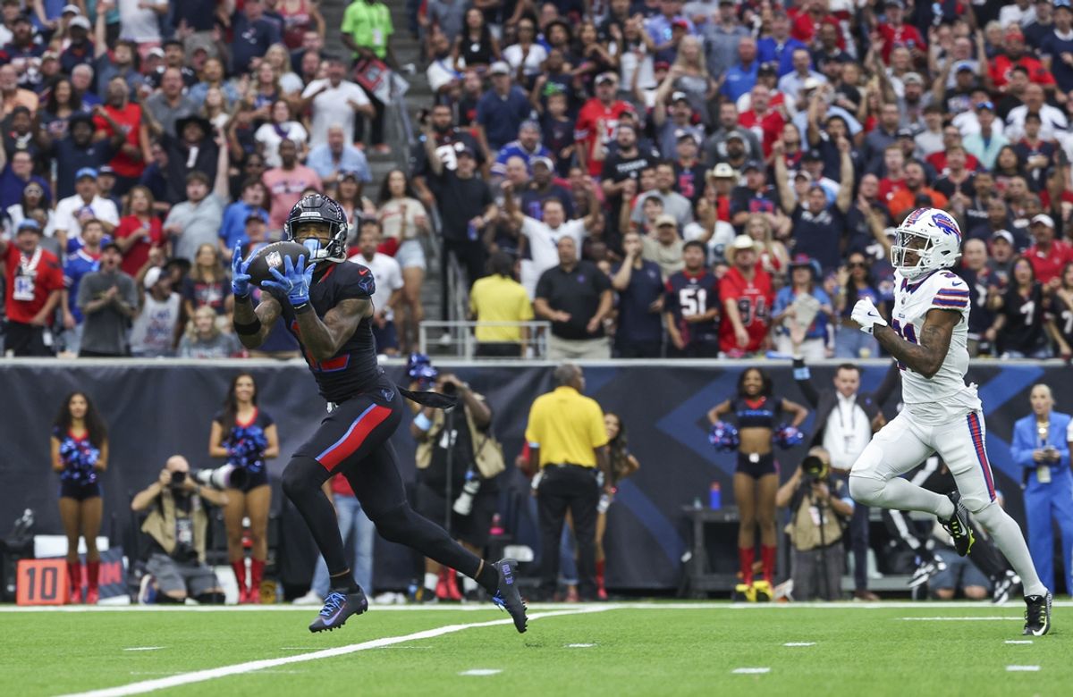 Oct 6, 2024; Houston, Texas, USA; Houston Texans wide receiver Nico Collins (12) makes a reception for a touchdown during the first quarter against the Buffalo Bills at NRG Stadium. Mandatory Credit: Troy Taormina-Imagn Images