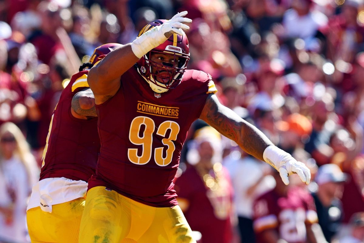 Oct 6, 2024; Landover, Maryland, USA; Washington Commanders defensive tackle Jonathan Allen (93) celebrates after a tackle during the second quarter against the Cleveland Browns at NorthWest Stadium. Mandatory Credit: Peter Casey-Imagn Images