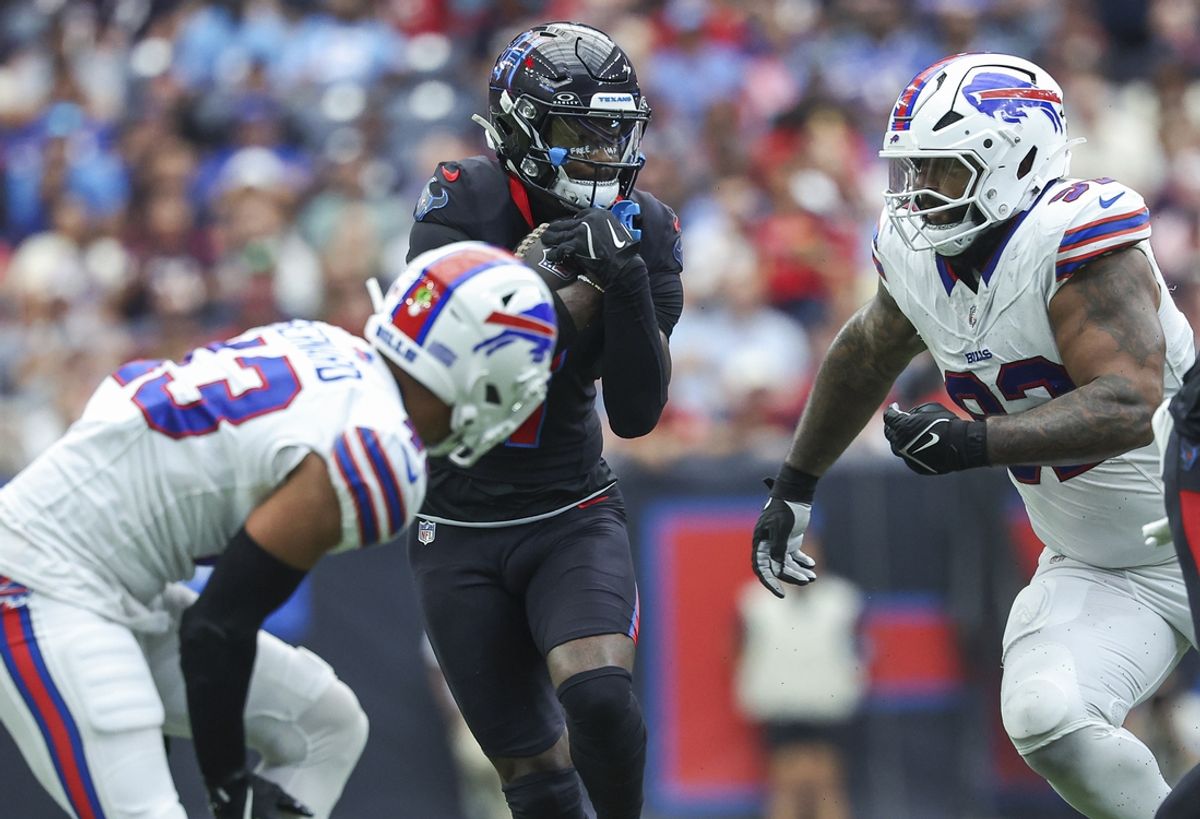 Oct 6, 2024; Houston, Texas, USA; Houston Texans wide receiver Stefon Diggs (1) runs with the ball after a reception during the second quarter against the Buffalo Bills at NRG Stadium. Mandatory Credit: Troy Taormina-Imagn Images