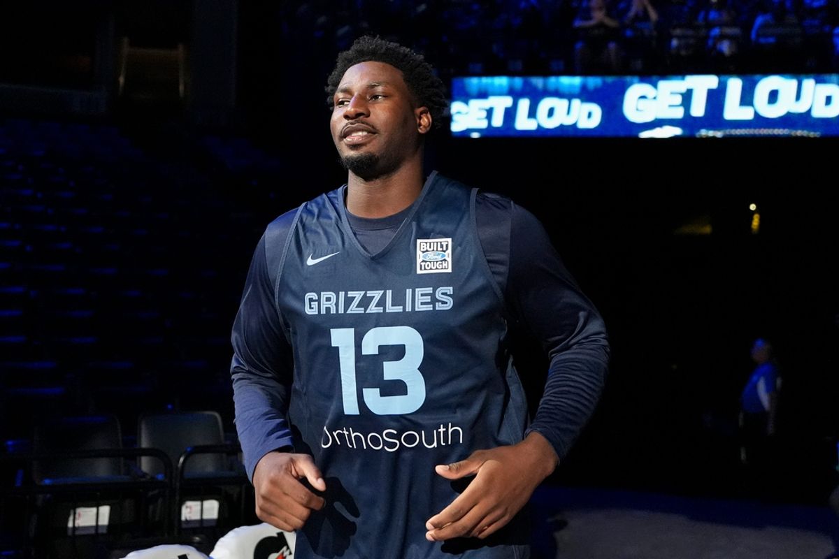 Grizzlies' Jaren Jackson Jr. (13) runs on the court as he is introduced during open practice at FedExForum in Memphis, Tenn., on Sunday, October 6, 2024.