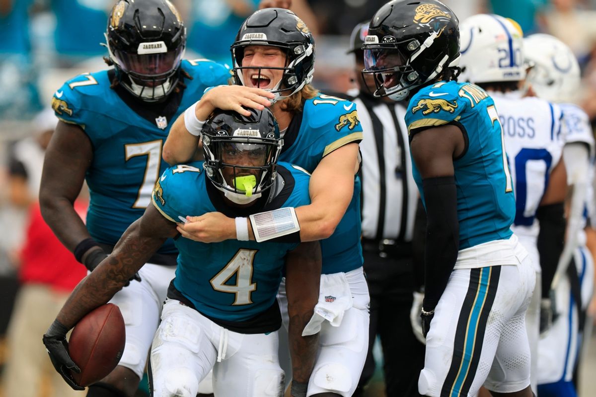 Jacksonville Jaguars quarterback Trevor Lawrence (16) celebrates a touchdown scored by running back Tank Bigsby (4) during the third quarter of NFL football matchup Sunday, Oct. 6, 2024 at EverBank Stadium in Jacksonville, Fla. [Corey Perrine/Florida Times-Union]