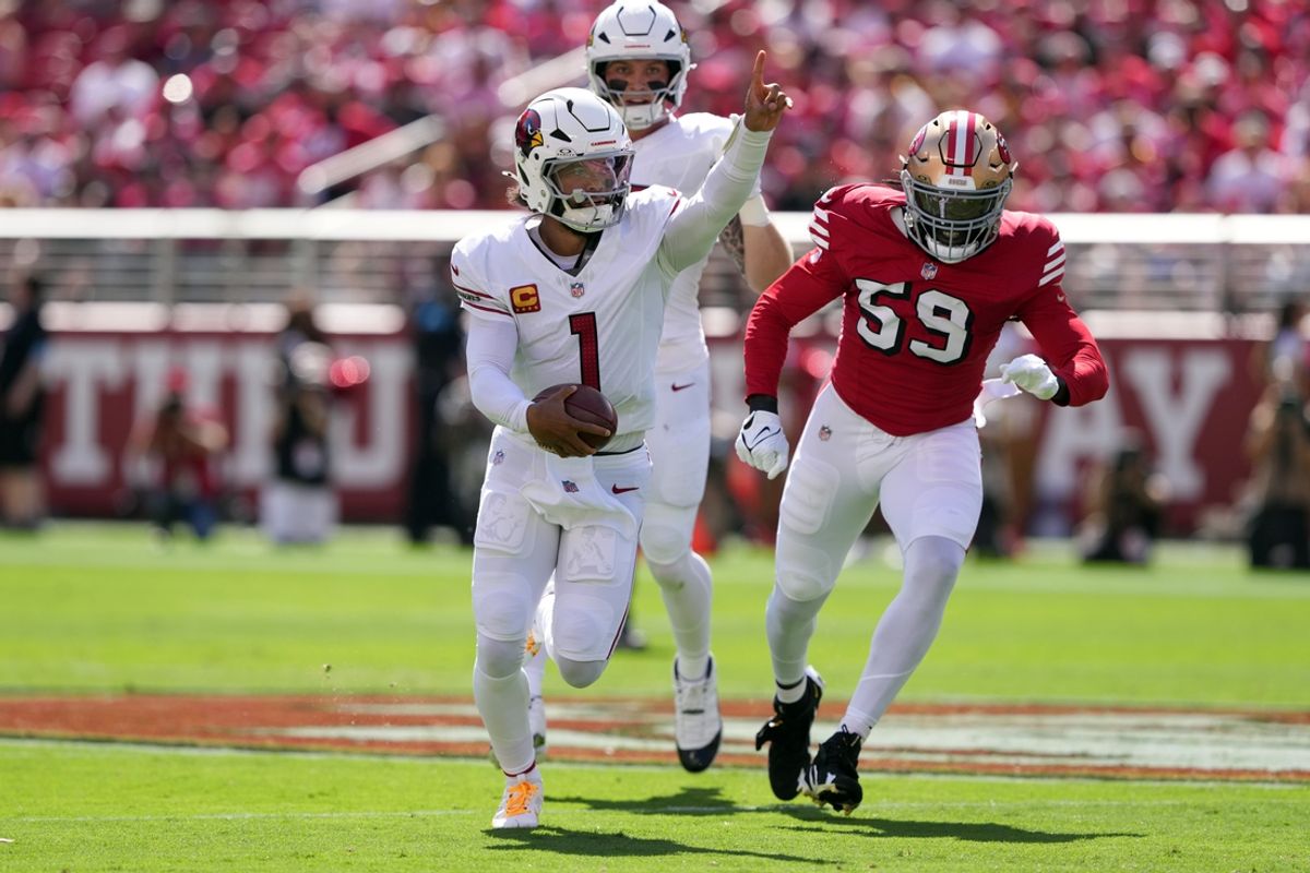 Oct 6, 2024; Santa Clara, California, USA; Arizona Cardinals quarterback Kyler Murray (1) gestures while rushing for a touchdown against the San Francisco 49ers linebacker De'Vondre Campbell (59) during the first quarter at Levi's Stadium. Mandatory Credit: Darren Yamashita-Imagn Images