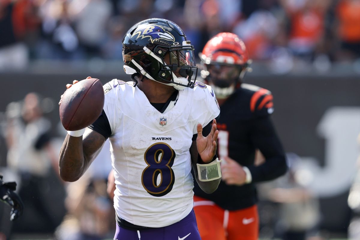 Oct 6, 2024; Cincinnati, Ohio, USA; Baltimore Ravens quarterback Lamar Jackson (8) drops to throw during the first half against the Cincinnati Bengals at Paycor Stadium. Mandatory Credit: Joseph Maiorana-Imagn Images