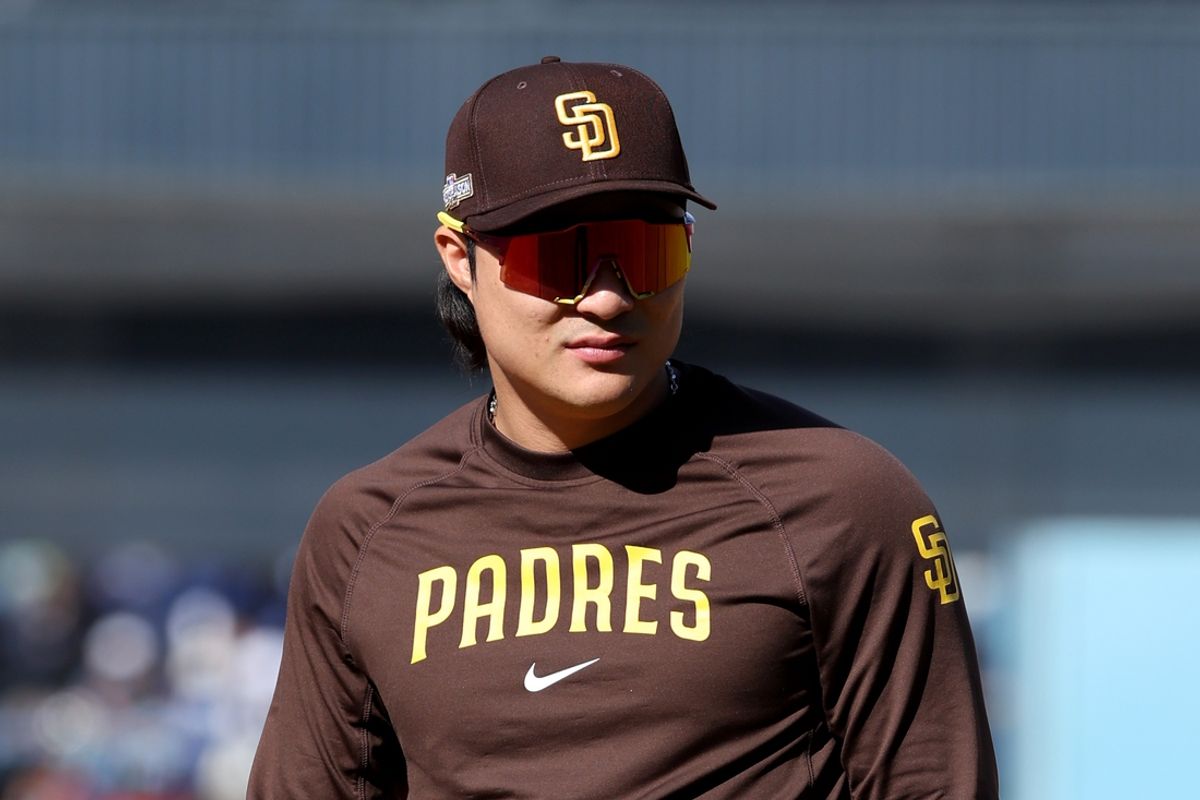 Oct 6, 2024; Los Angeles, California, USA; San Diego Padres shortstop Ha-Seong Kim (7) looks on during warm ups before game two against the Los Angeles Dodgers in the NLDS for the 2024 MLB Playoffs at Dodger Stadium. Mandatory Credit: Kiyoshi Mio-Imagn Images