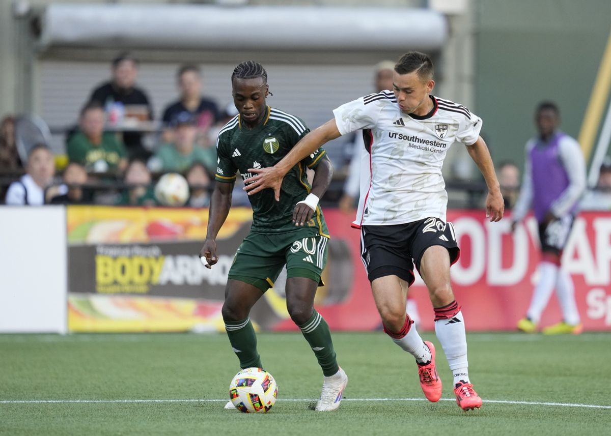 Oct 6, 2024; Portland, Oregon, USA; Portland Timbers forward Santiago Moreno (30) battles FC Dallas defender Sam Junqua (29) for control of a ball during the first half at Providence Park. Mandatory Credit: Soobum Im-Imagn Images