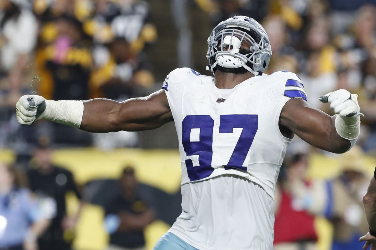 Oct 6, 2024; Pittsburgh, Pennsylvania, USA;  Dallas Cowboys defensive tackle Osa Odighizuwa (97) reacts to sacking Pittsburgh Steelers quarterback Justin Fields (not pictured) during the second quarter at Acrisure Stadium. Mandatory Credit: Charles LeClaire-Imagn Images