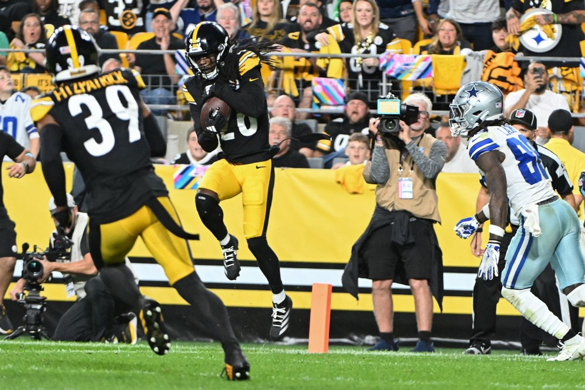 Oct 6, 2024; Pittsburgh, Pennsylvania, USA; Pittsburgh Steelers cornerback Donte Jackson (26) intercepts a pass in front of Dallas Cowboys wide receiver CeeDee Lamb (88) during the second quarter at Acrisure Stadium. Mandatory Credit: Barry Reeger-Imagn Images