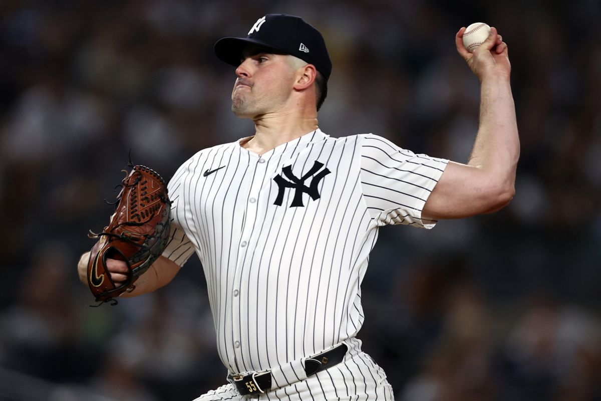 Oct 7, 2024; Bronx, New York, USA; New York Yankees pitcher Carlos Rodon (55) throws a pitch against the Kansas City Royals in the first inning during game two of the ALDS for the 2024 MLB Playoffs at Yankee Stadium. Mandatory Credit: Vincent Carchietta-Imagn Images