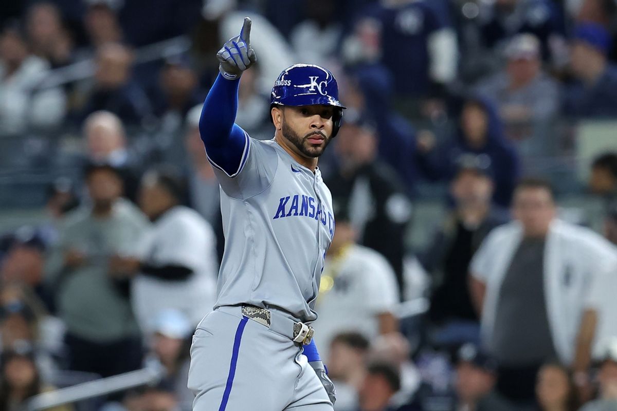 Oct 7, 2024; Bronx, New York, USA; Kansas City Royals outfielder Tommy Pham (22) reacts after a RBI single against the New York Yankees in the fourth inning during game two of the ALDS for the 2024 MLB Playoffs at Yankee Stadium. Mandatory Credit: Brad Penner-Imagn Images