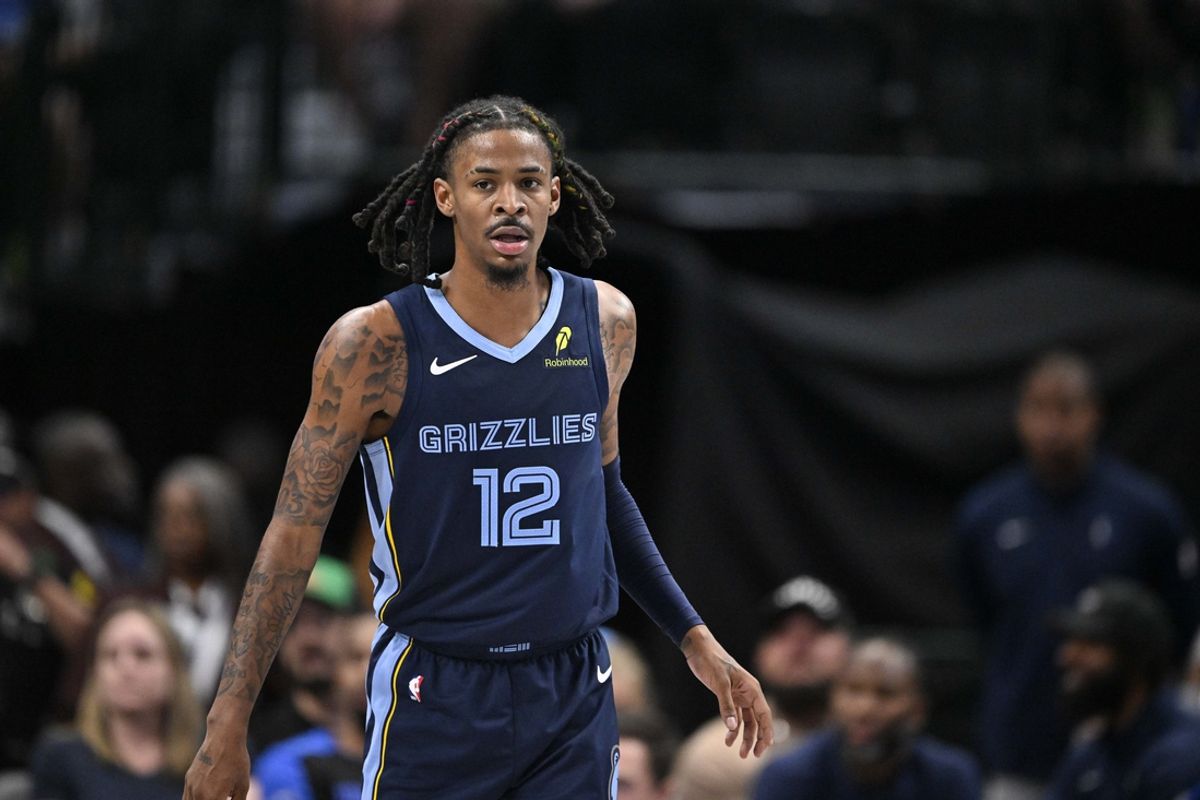 Oct 7, 2024; Dallas, Texas, USA; Memphis Grizzlies guard Ja Morant (12) looks on during the second half against the Dallas Mavericks at the American Airlines Center. Mandatory Credit: Jerome Miron-Imagn Images