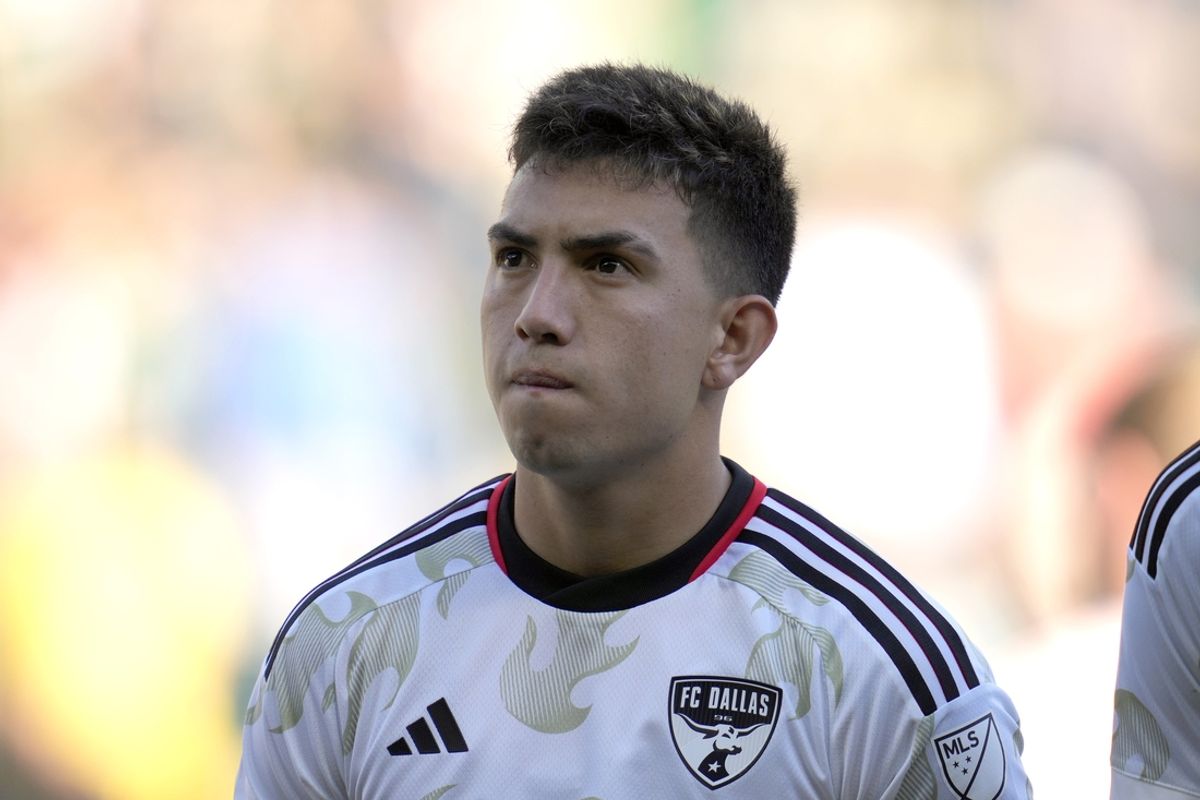 Oct 6, 2024; Portland, Oregon, USA; FC Dallas forward Alan Velasco (20) stands during the singing of the National Anthem before a game against the Portland Timbers at Providence Park. Mandatory Credit: Soobum Im-Imagn Images
