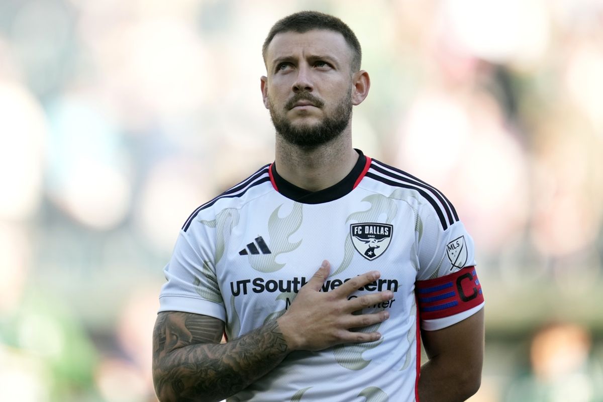 Oct 6, 2024; Portland, Oregon, USA; FC Dallas forward Paul Arriola (7) stands during the singing of the National Anthem before a game against the Portland Timbers at Providence Park. Mandatory Credit: Soobum Im-Imagn Images