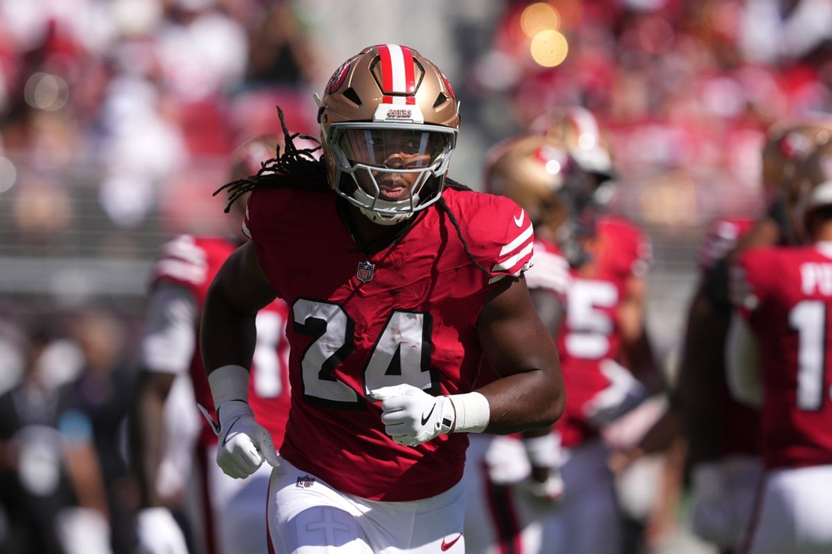 Oct 6, 2024; Santa Clara, California, USA; San Francisco 49ers running back Jordan Mason (24) during the first quarter against the Arizona Cardinals at Levi's Stadium. Mandatory Credit: Darren Yamashita-Imagn Images