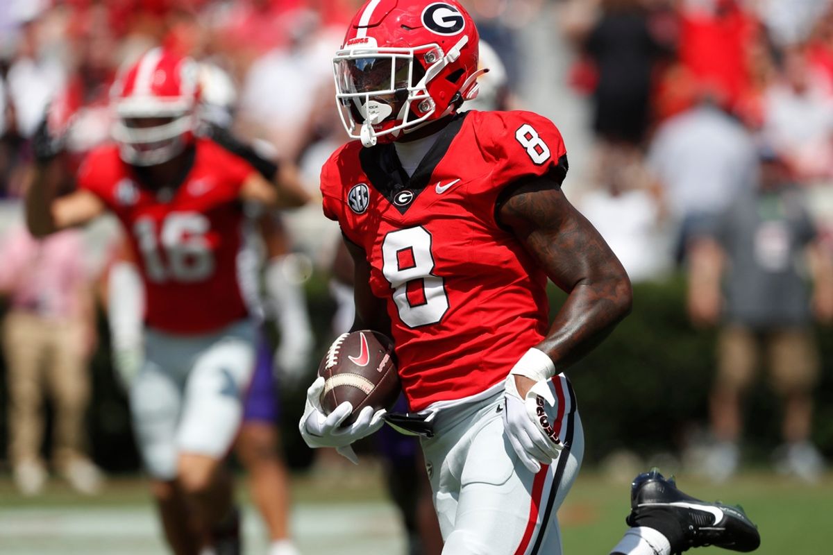 Georgia wide receiver Colbie Young (8) drives in to score a touchdown after pulling in a pass from Georgia quarterback Carson Beck (15) during the first half of a NCAA college football game against Tennessee Tech in Athens, on Saturday, Sept. 7, 2024.