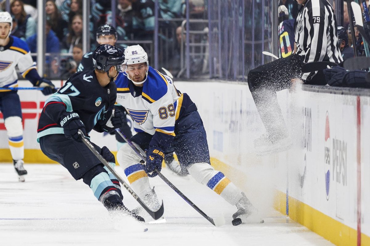 Oct 8, 2024; Seattle, Washington, USA; St. Louis Blues left wing Pavel Buchnevich (89) skates against Seattle Kraken center Jaden Schwartz (17) during the second period at Climate Pledge Arena. Mandatory Credit: Caean Couto-Imagn Images