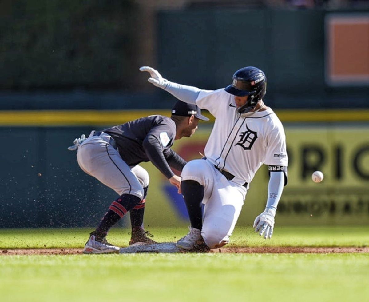Detroit Tigers Wenceel Perez slides into second base against Guardians shortstop Brayan Rocchio during the fourth inning at Game 3 of ALDS at Comerica Park in Detroit on Wednesday, Oct. 9 2024.