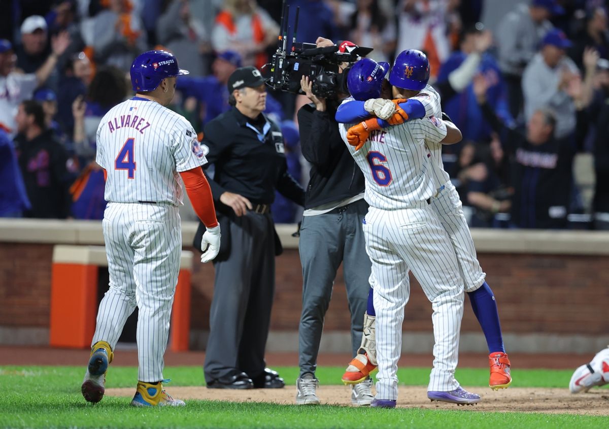 Oct 9, 2024; New York, New York, USA; New York Mets shortstop Francisco Lindor (12) celebrates with Mets outfielder Starling Marte (6) after hitting a grand slam against the Philadelphia Phillies in the sixth inning in game four of the NLDS for the 2024 MLB Playoffs at Citi Field. Mandatory Credit: Brad Penner-Imagn Images