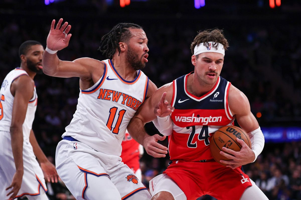Oct 9, 2024; New York, New York, USA; Washington Wizards forward Corey Kispert (24) is defended by New York Knicks guard Jalen Brunson (11) during the first quarter at Madison Square Garden. Mandatory Credit: Vincent Carchietta-Imagn Images