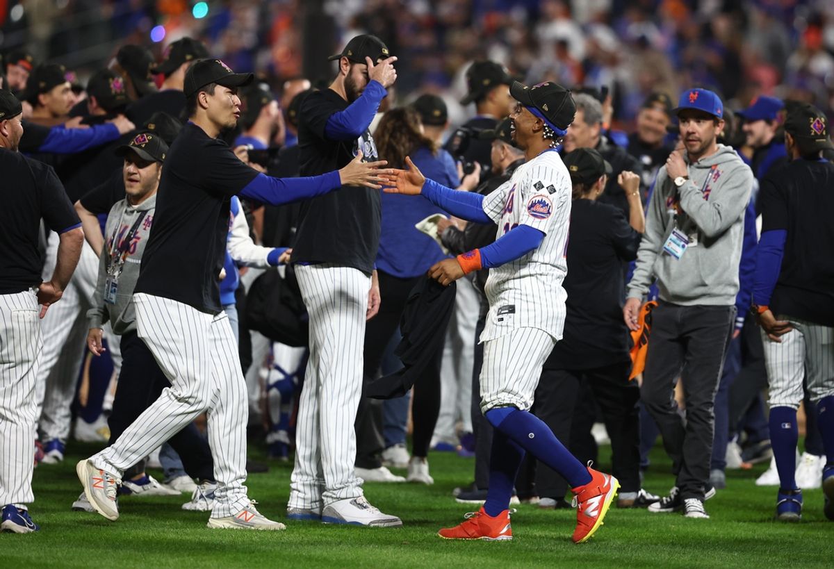 Oct 9, 2024; New York, New York, USA;  New York Mets shortstop Francisco Lindor (12) and New York Mets pitcher Kodai Senga (34) celebrate after defeating the Philadelphia Phillies in game four of the NLDS for the 2024 MLB Playoffs at Citi Field. Mandatory Credit: Wendell Cruz-Imagn Images