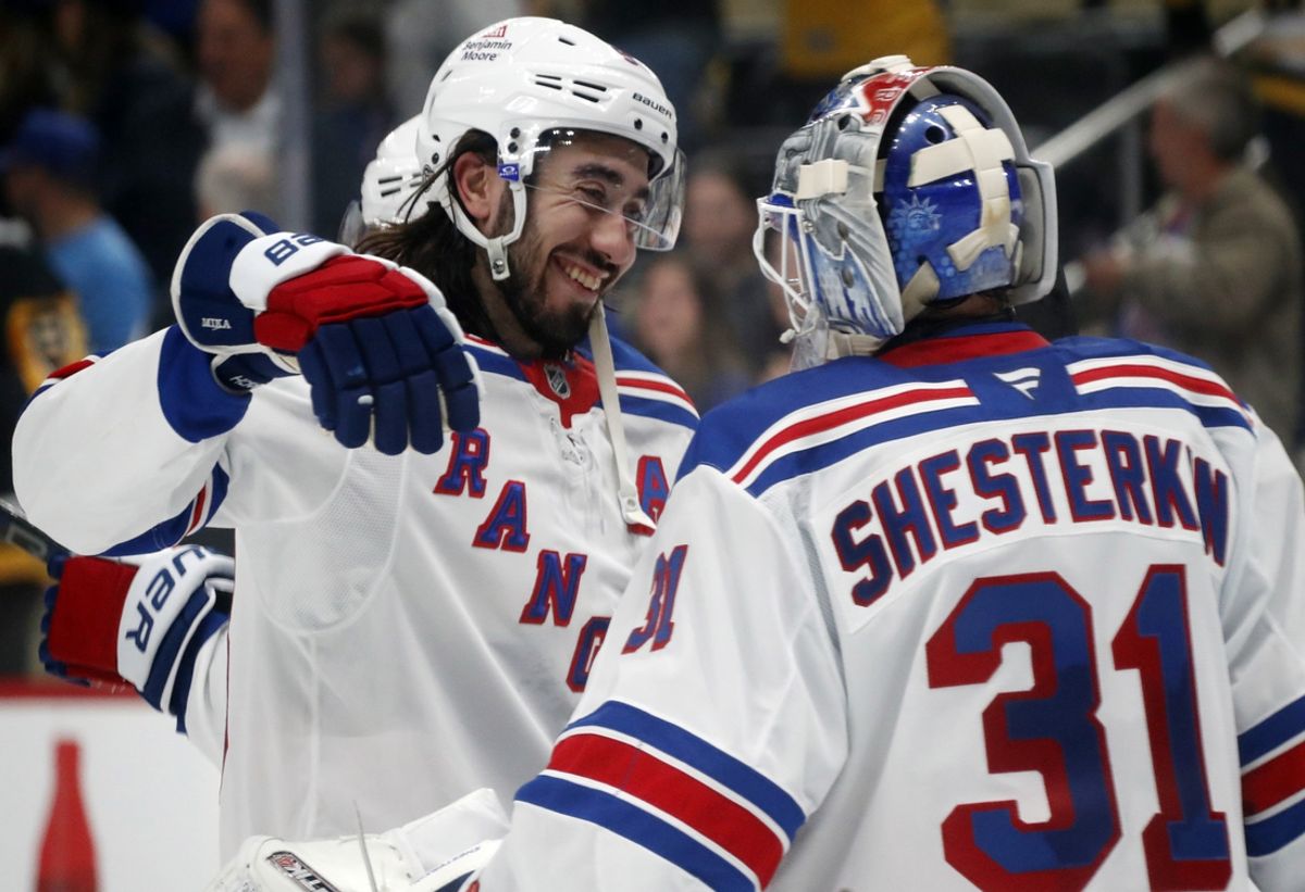Oct 9, 2024; Pittsburgh, Pennsylvania, USA;  New York Rangers center Mika Zibanejad (93) and goaltender Igor Shesterkin (31) celebrate after defeating the Pittsburgh Penguins at PPG Paints Arena. Mandatory Credit: Charles LeClaire-Imagn Images