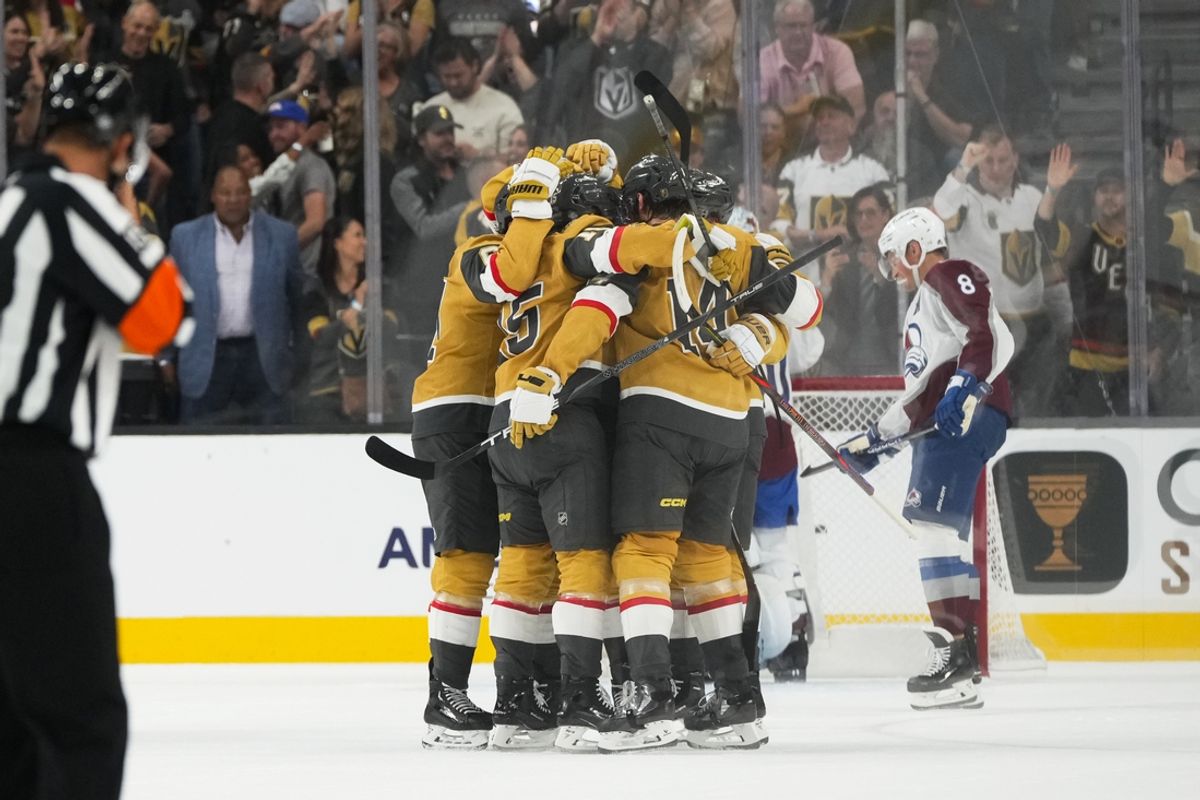 Oct 9, 2024; Las Vegas, Nevada, USA; The Vegas Golden Knights celebrate after scoring a goal against the Colorado Avalanche during the first period at T-Mobile Arena. Mandatory Credit: Lucas Peltier-Imagn Images