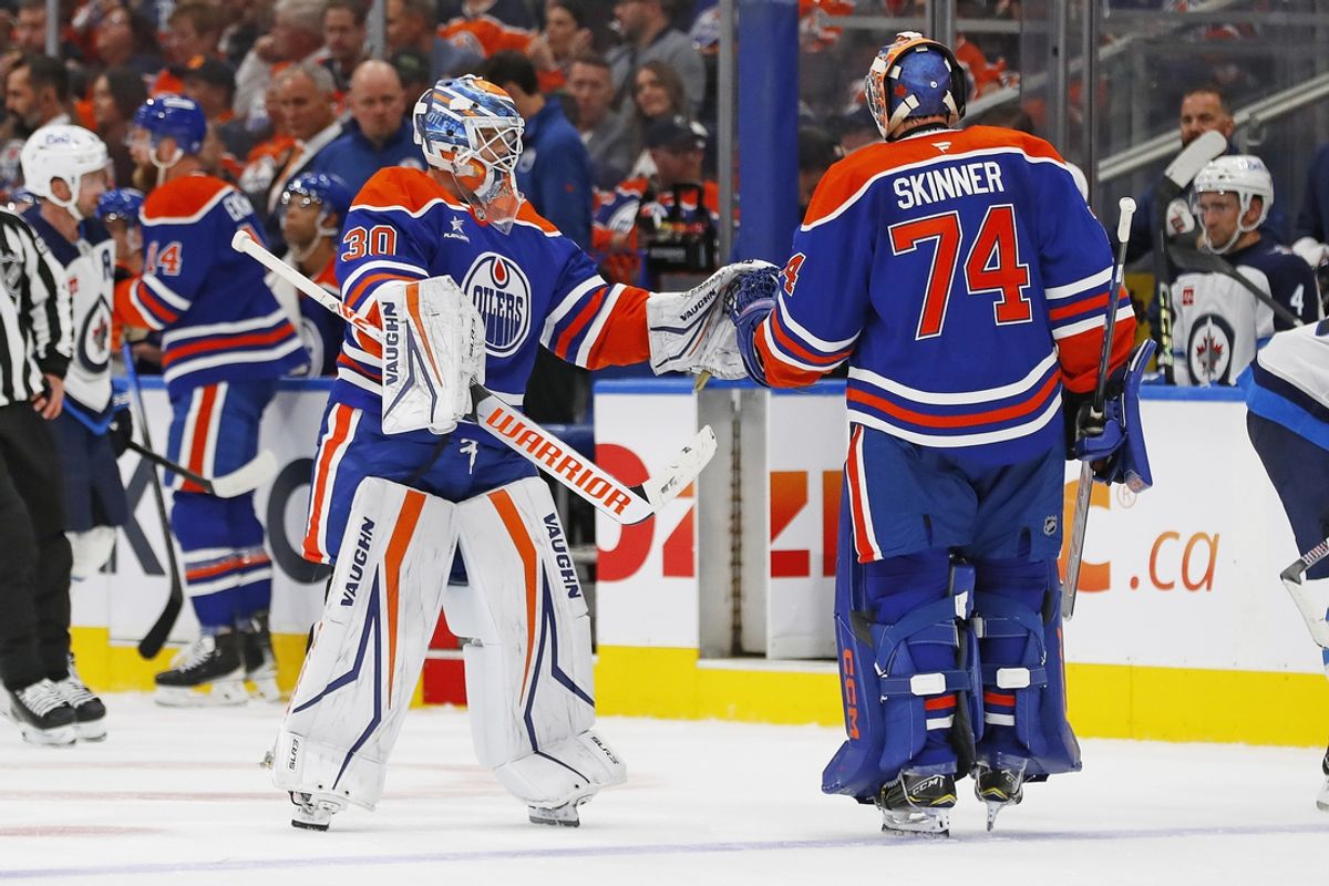 Oct 9, 2024; Edmonton, Alberta, CAN; Edmonton Oilers goaltender Calvin Pickard (30) replaces goaltender Stuart Skinner (74) after he gave up 5 goals on 13 shots against the Winnipeg Jets at Rogers Place. Mandatory Credit: Perry Nelson-Imagn Images